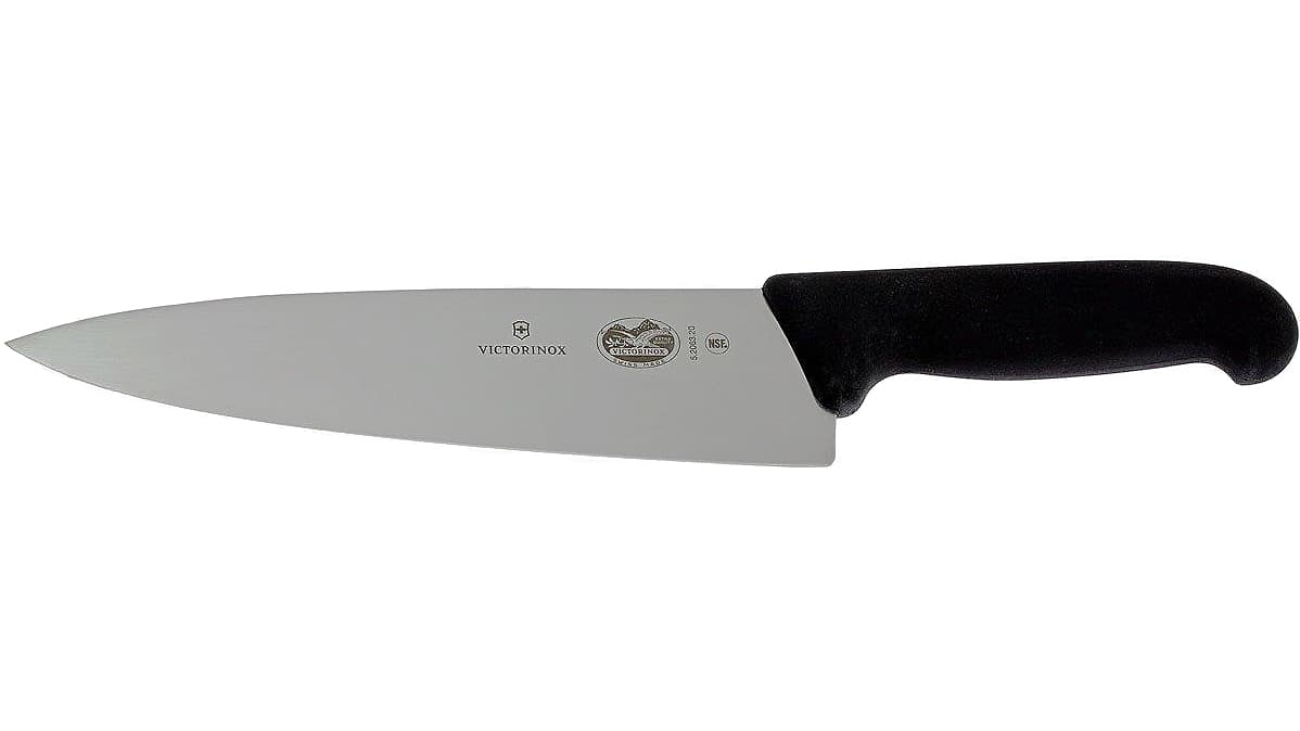 Victorinox Fibrox 5.2063.20 eight-inch chef’s knife with a black textured TPE handle on a white background